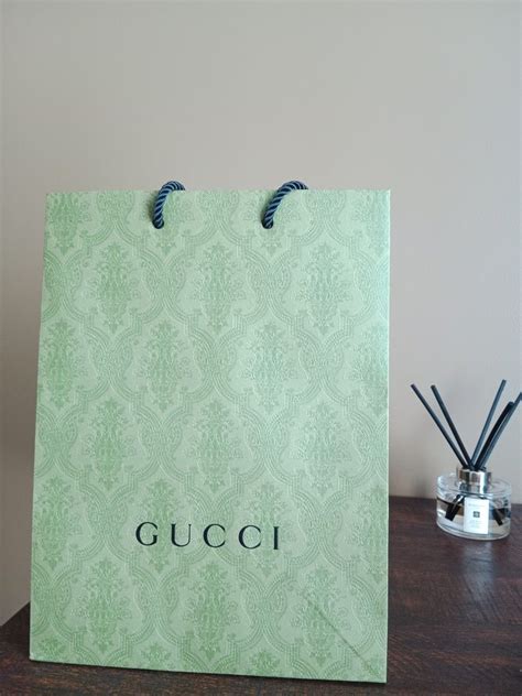 gucci paper bag home decor